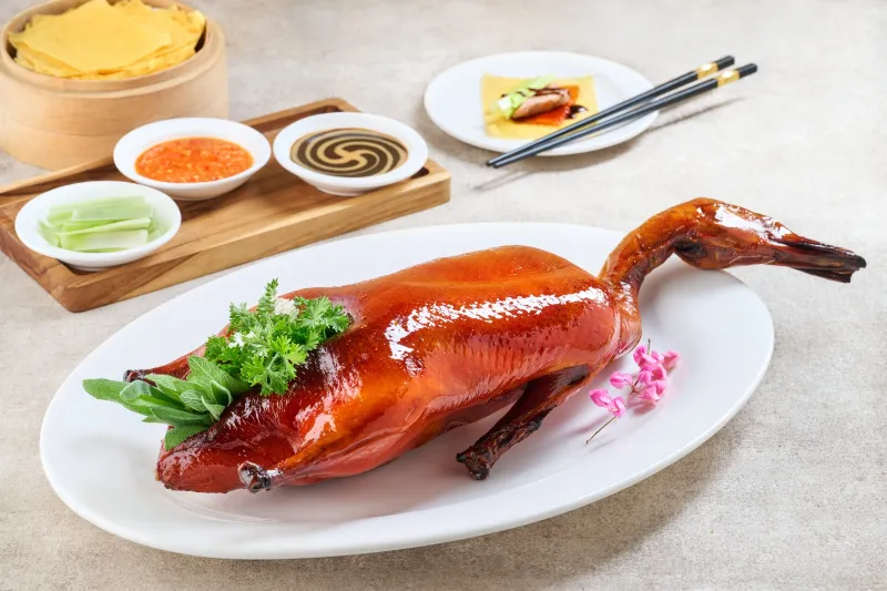 THE PECKING DUCK